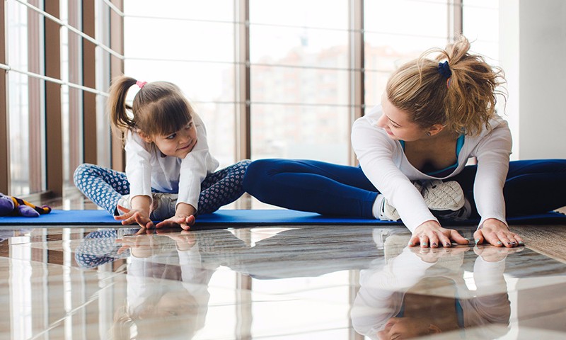 Mother and daughter streching